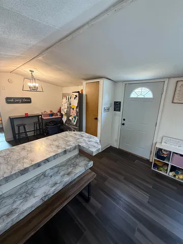 a living room with wooden floor