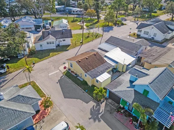 an aerial view of a house with a garden