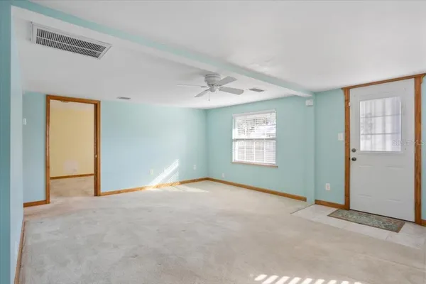 an empty room with windows