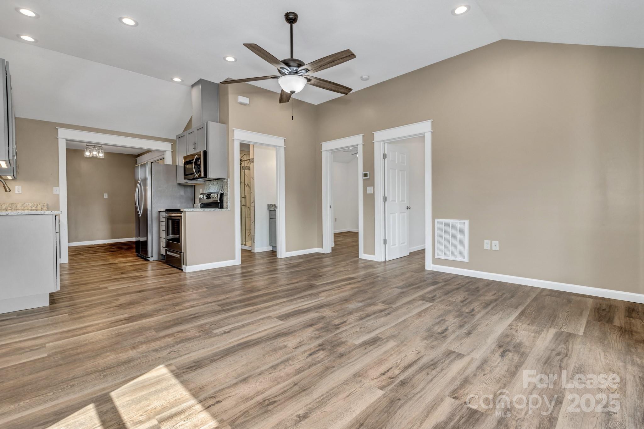 150 Oak Hill Road Candler, NC 28715 - Photo 14 of 44 a view of a livingroom with a kitchen