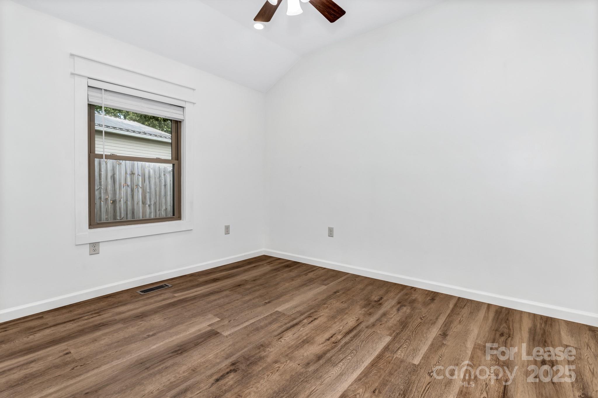 150 Oak Hill Road Candler, NC 28715 - Photo 30 of 44 an empty room with a window