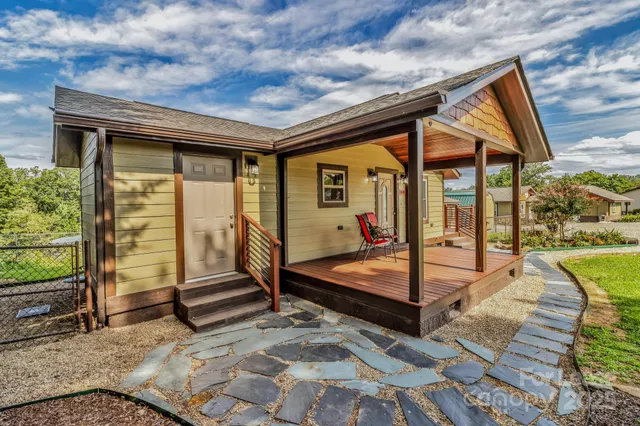a view of swimming pool with seating space