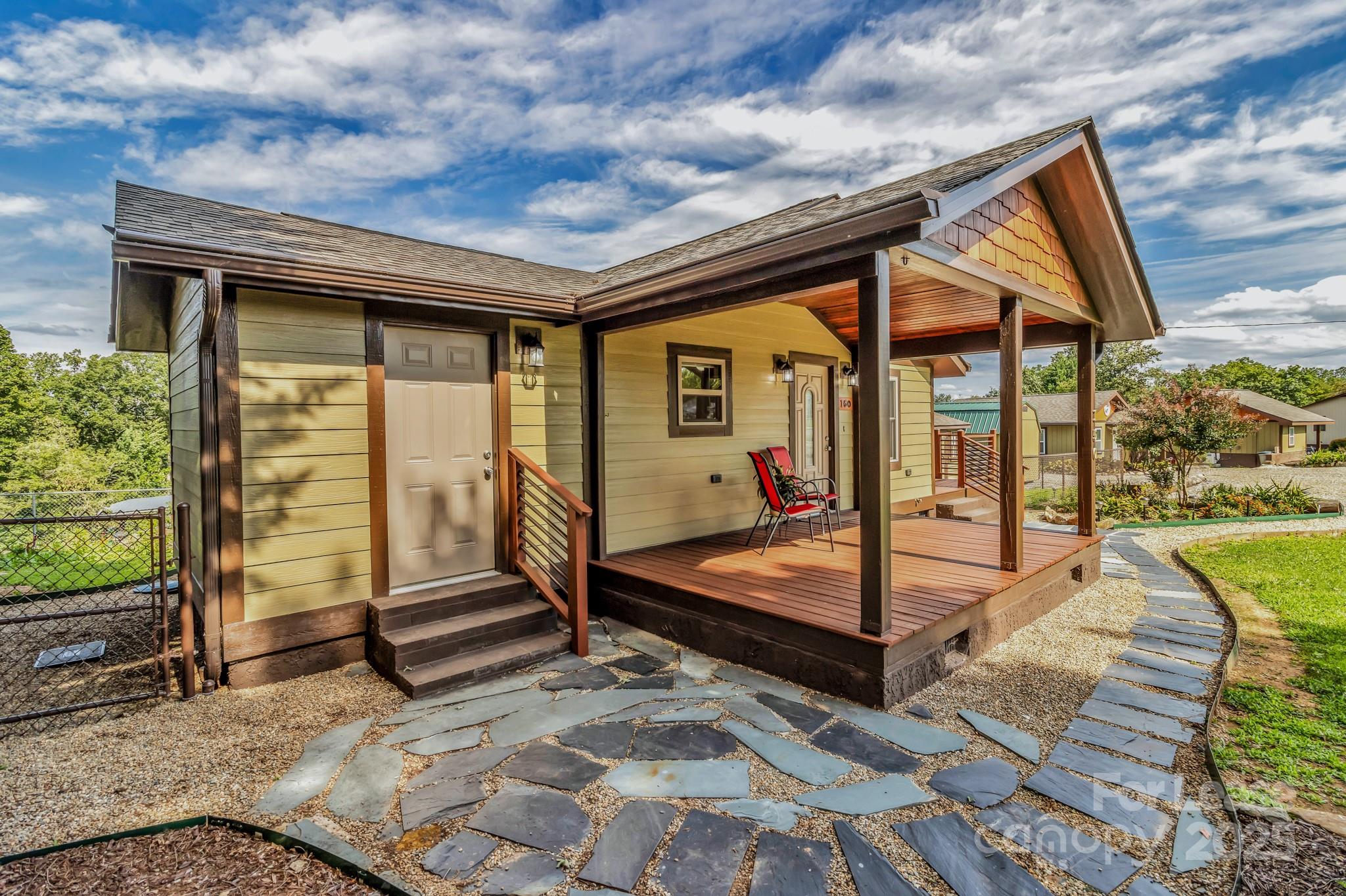150 Oak Hill Road Candler, NC 28715 - Photo 3 of 44 a view of swimming pool with seating space