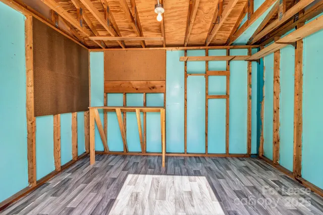 a view of wooden floor with a outdoor space