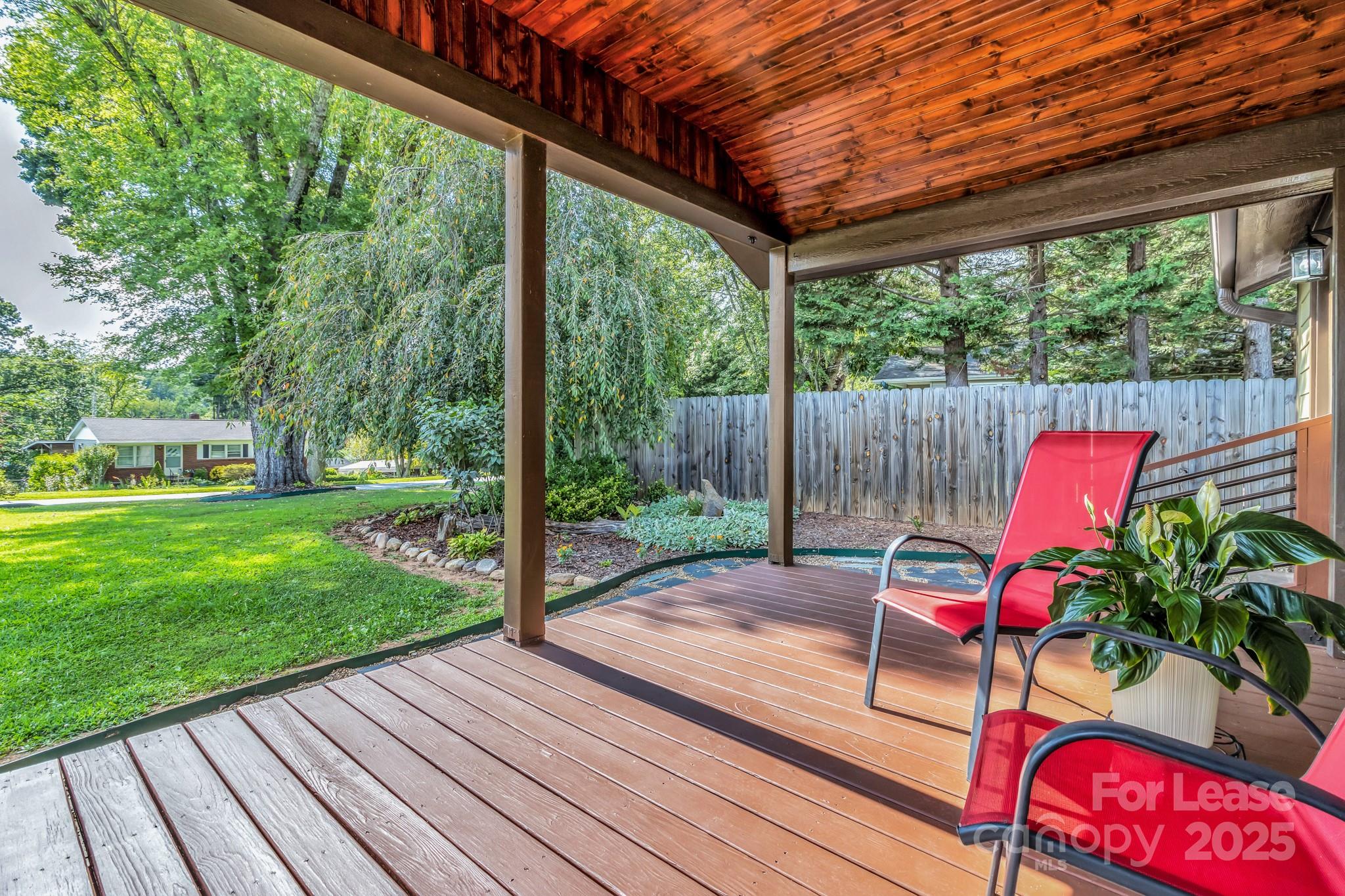 150 Oak Hill Road Candler, NC 28715 - Photo 7 of 44 a view of outdoor space with seating