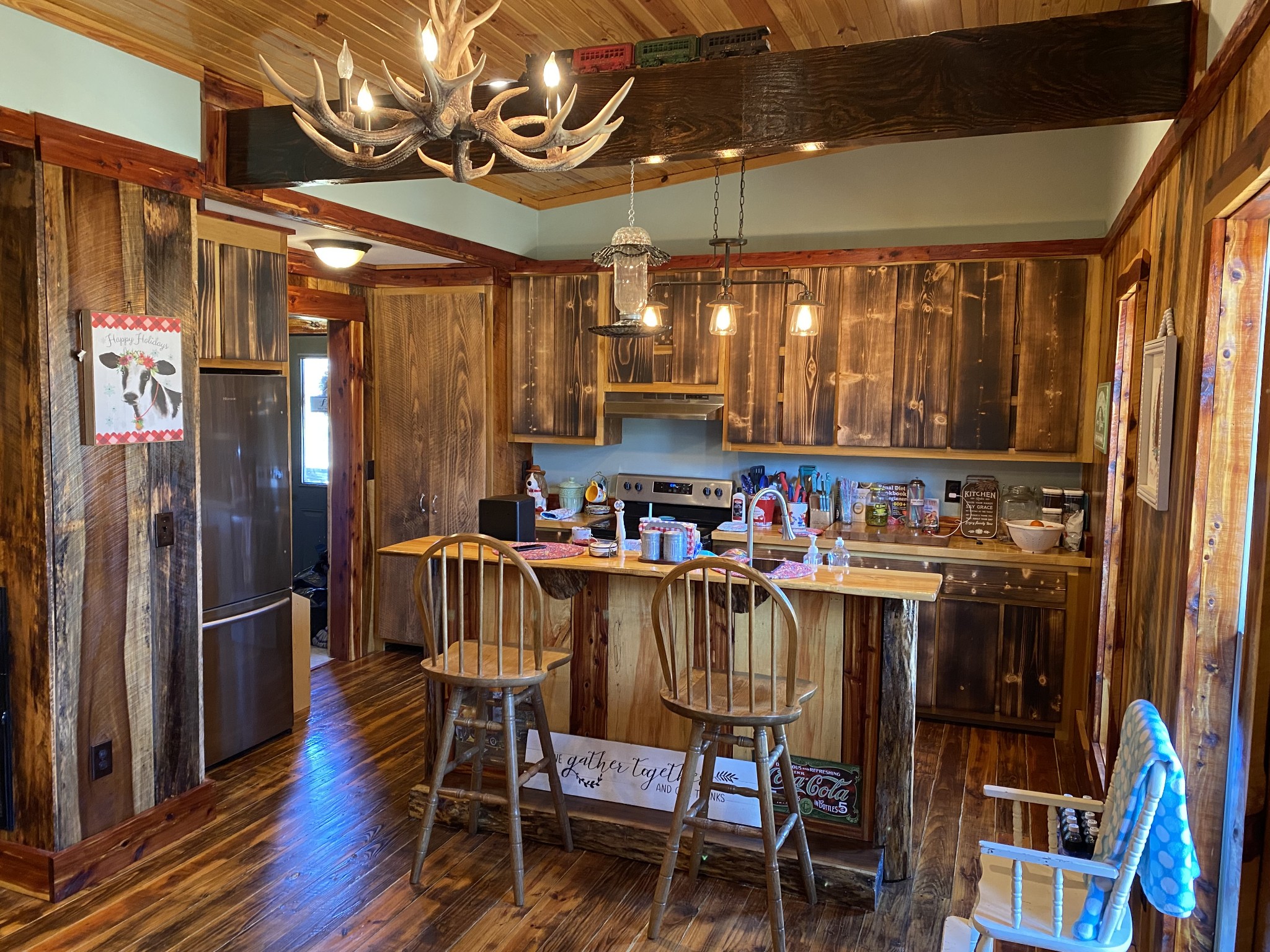 1063 Swan Mill Road Morrison, TN 37357 - Photo 15 of 35 a view of a dining room with furniture window and wooden floor