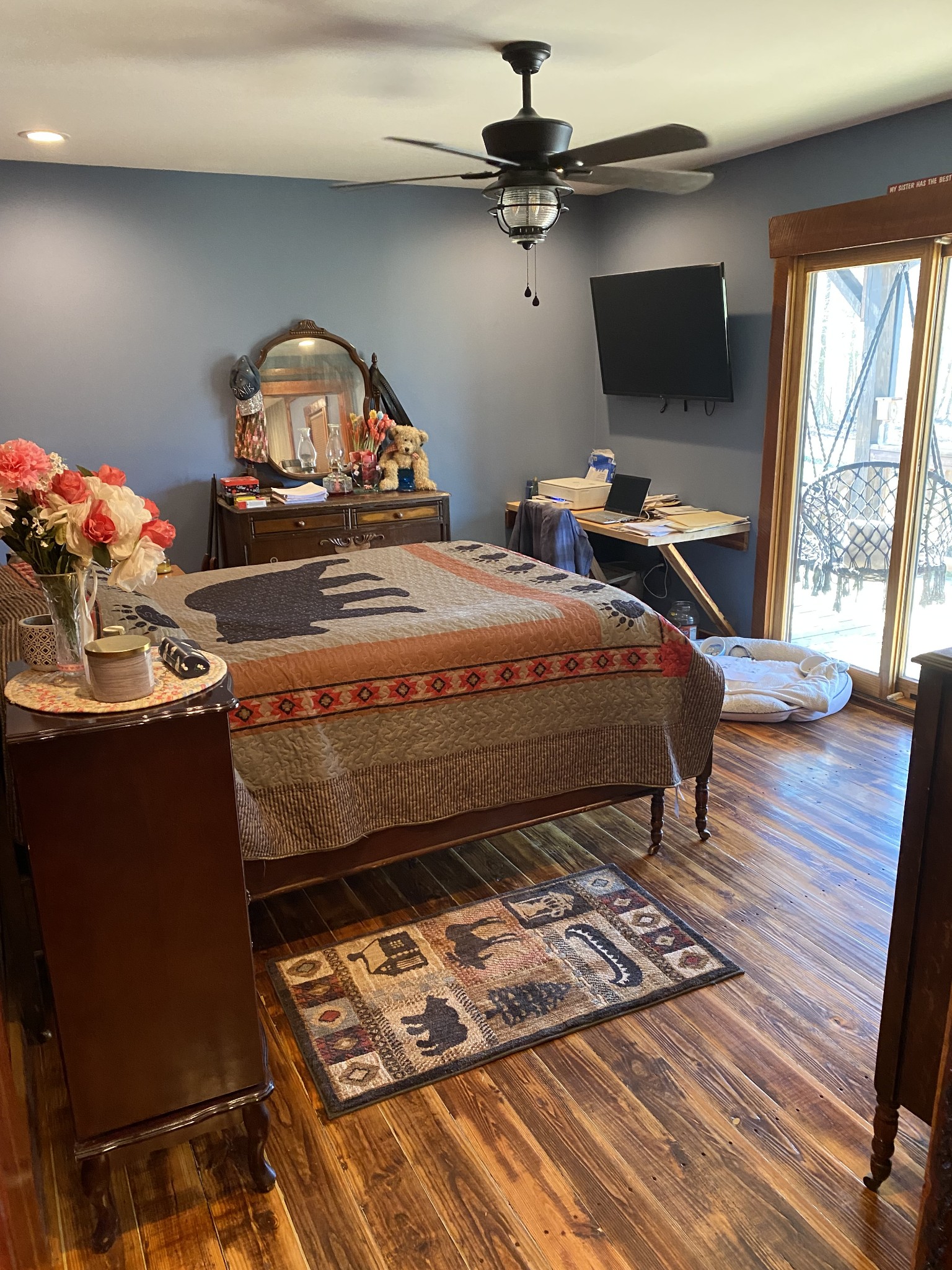 1063 Swan Mill Road Morrison, TN 37357 - Photo 18 of 35 a bedroom with a bed window and a flat screen tv
