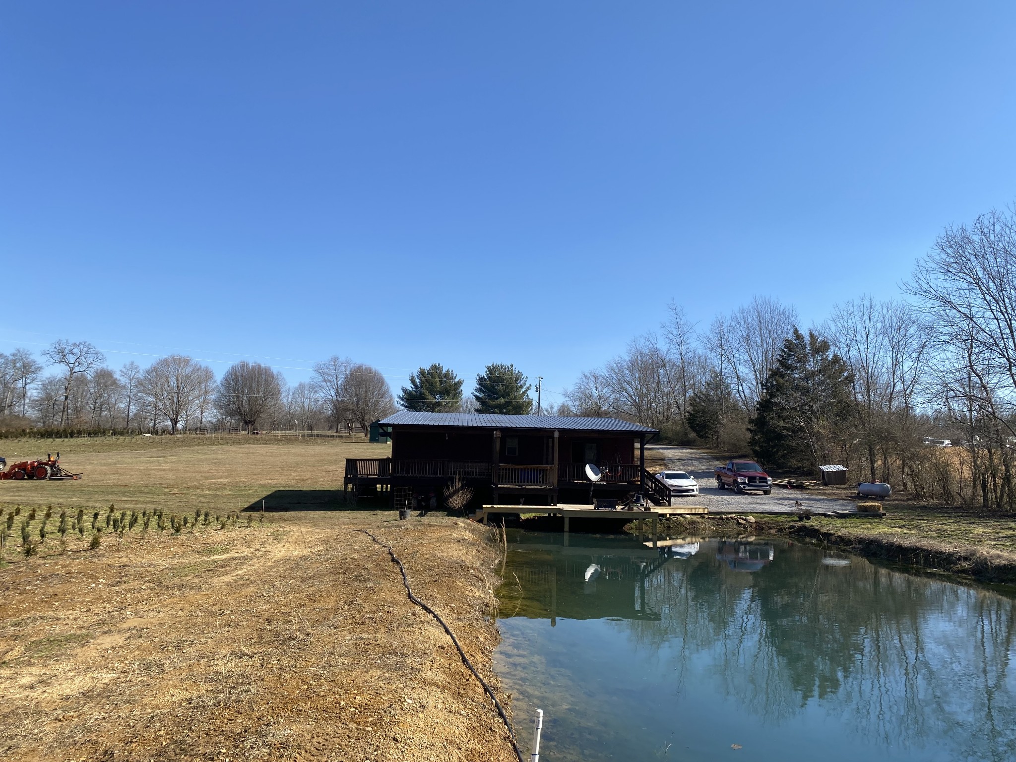 1063 Swan Mill Road Morrison, TN 37357 - Photo 32 of 35 a view of a lake with houses in the back