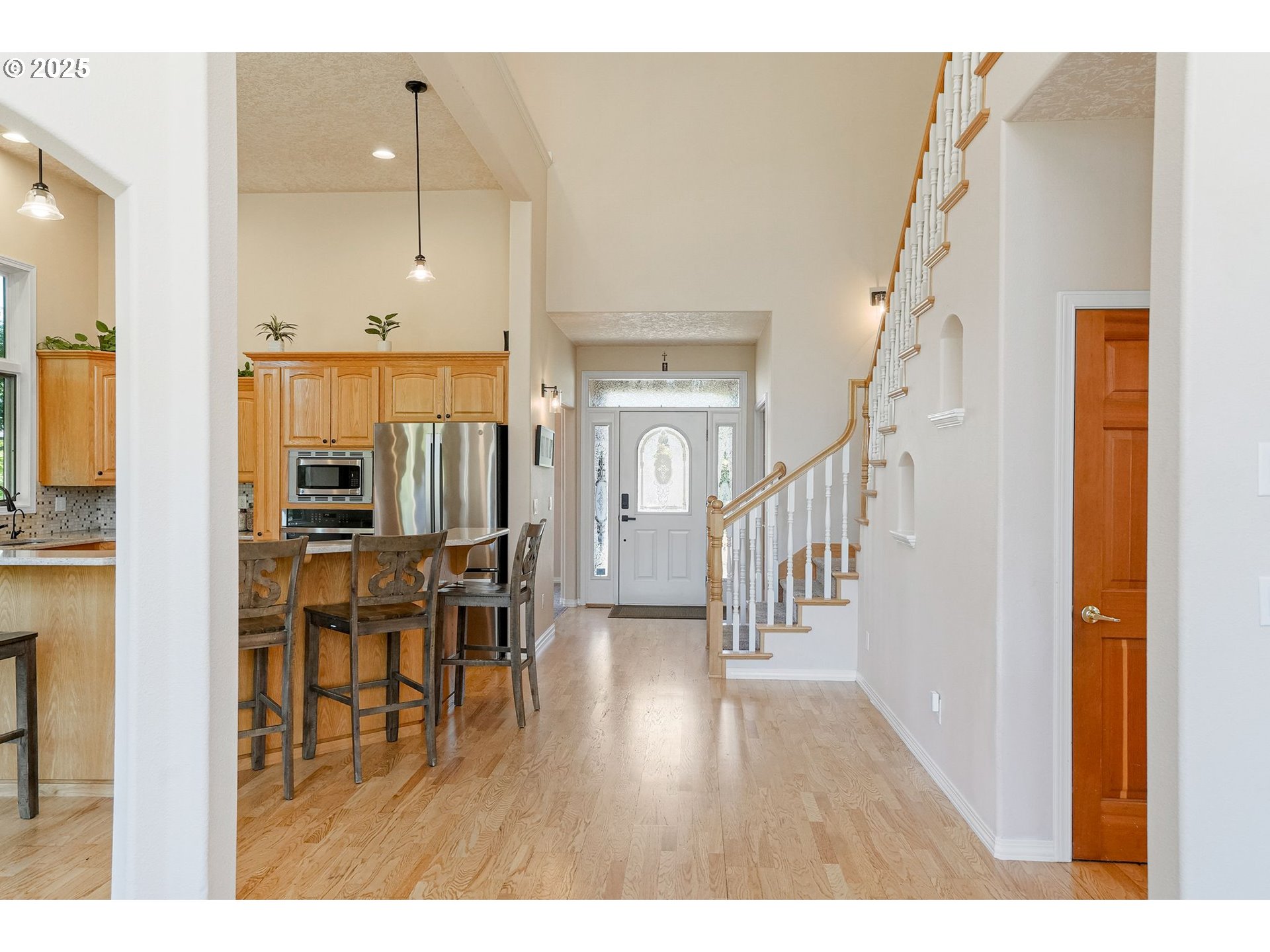 2815 Hazelnut Drive Woodburn, OR 97071 - Photo 14 of 22 a view of dining room with wooden floor