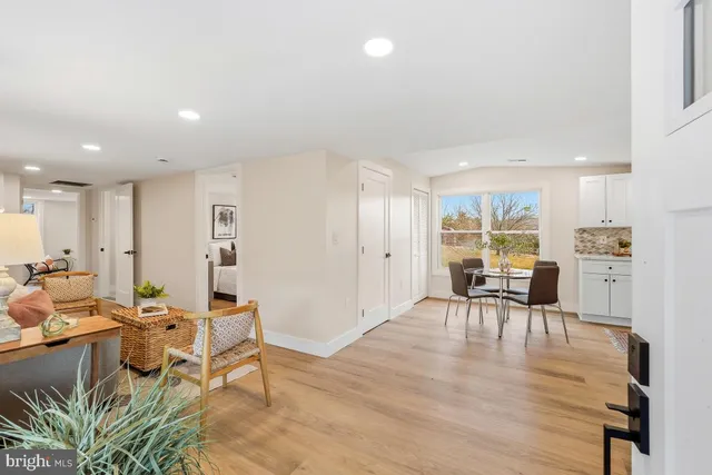 a view of a livingroom with furniture and a table