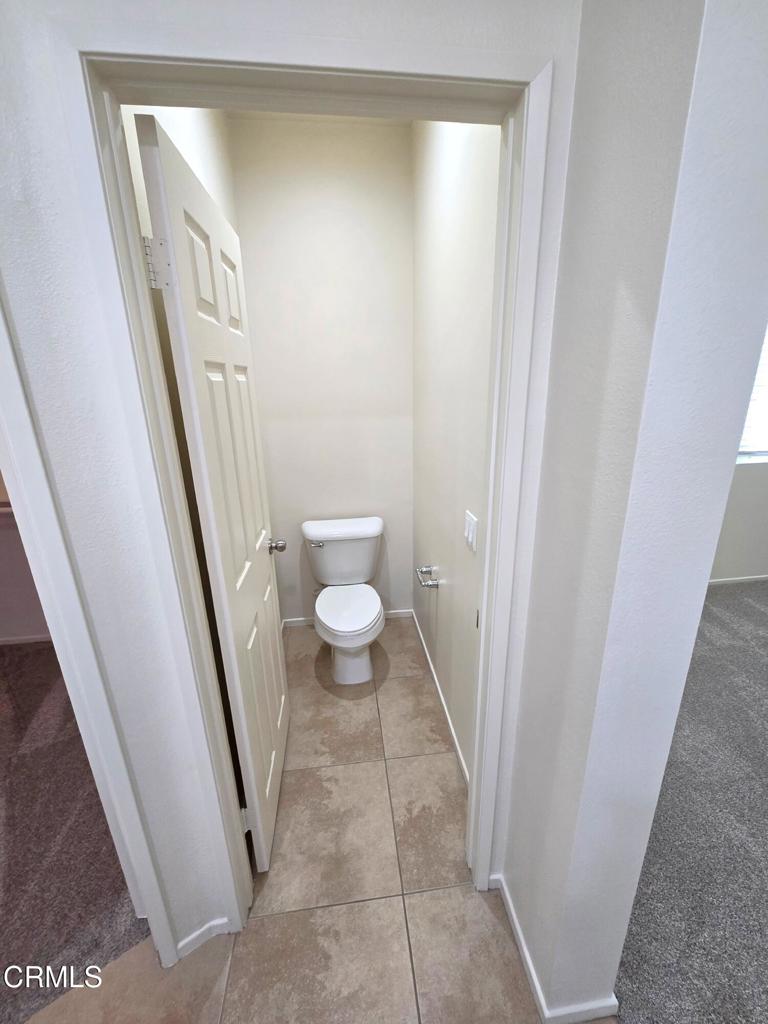 3319 North Ventura Road Oxnard, CA 93036 - Photo 19 of 25 a bathroom with a sink and a toilet