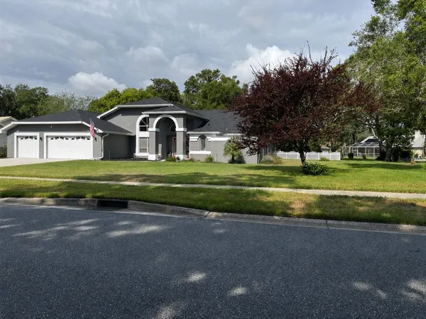 $595,000 | 18561 Winding Oaks Boulevard, Hudson, FL 34667