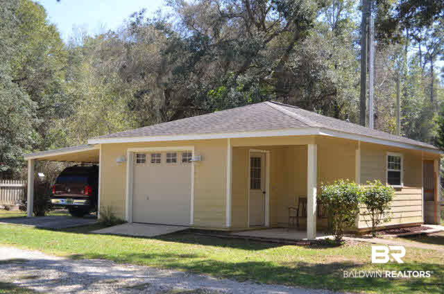 8919 Red Fish Pt Road Lillian, AL 36549 - Photo 9 of 46 24x24 Workshop w/carport and additional storage. Could be converted to a cottage or in-law suite.