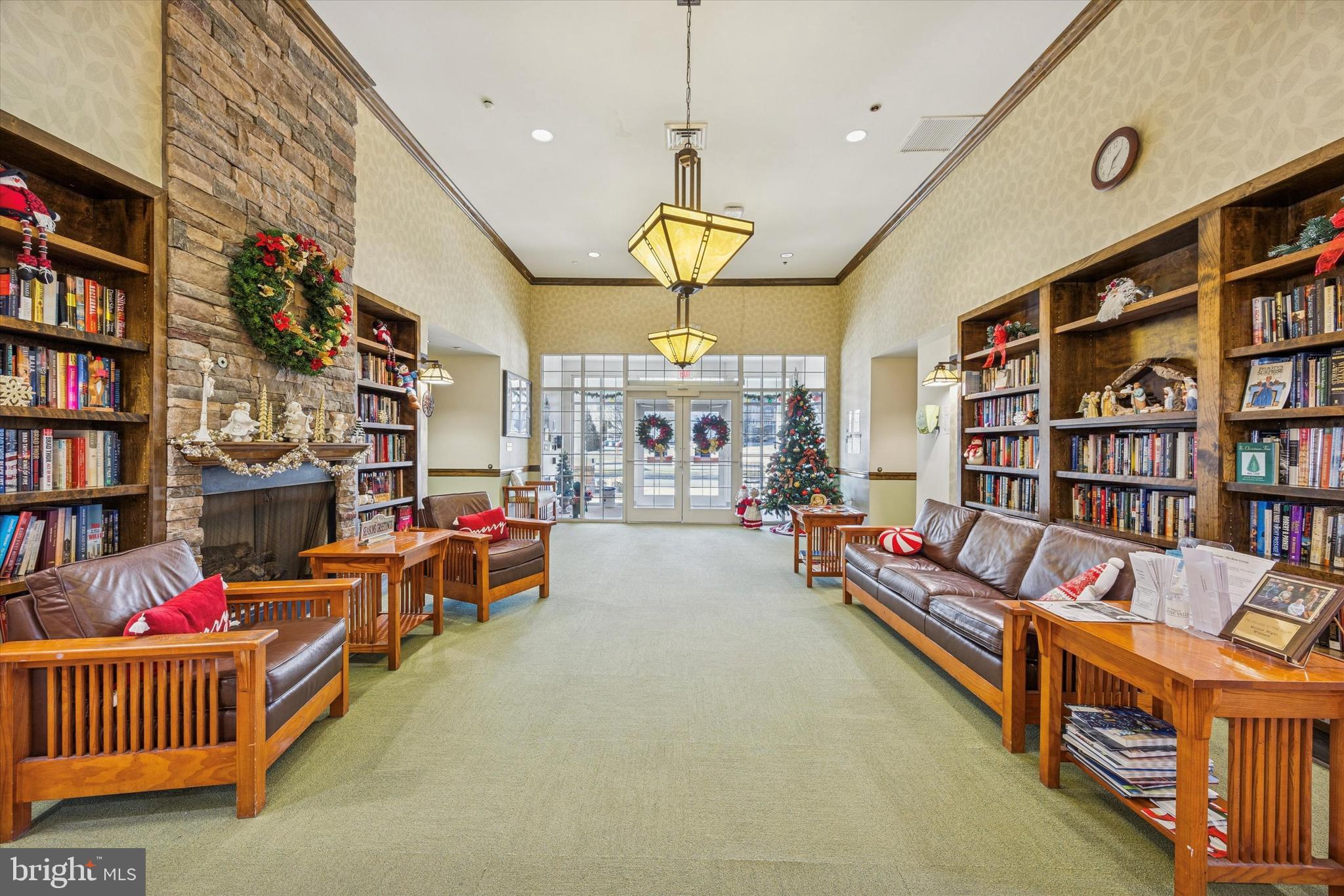 300 Tyler Court, Unit 431 Philadelphia, PA 19111 - Photo 23 of 29 a living room with furniture cabinets and book shelf
