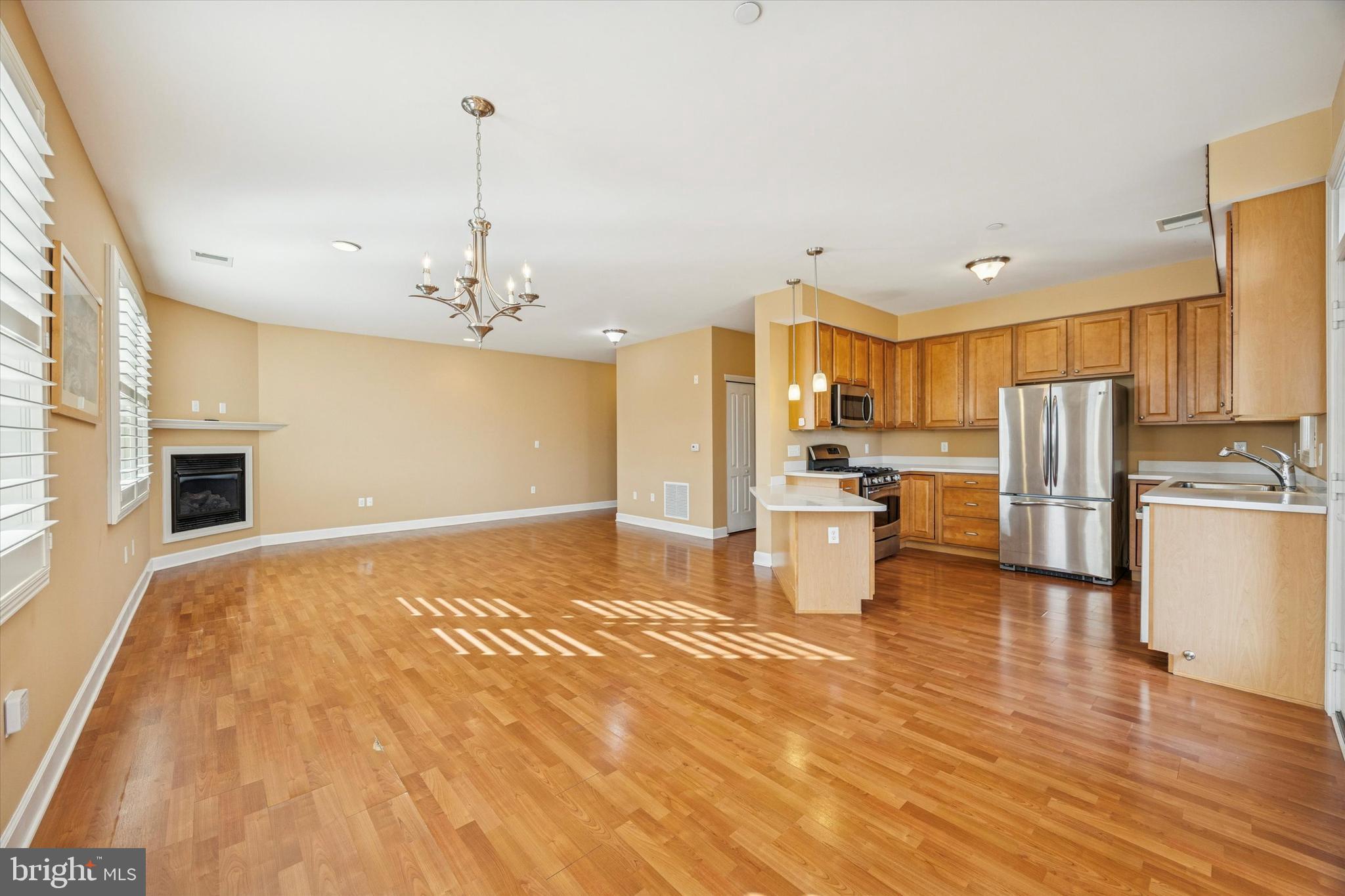 300 Tyler Court, Unit 431 Philadelphia, PA 19111 - Photo 4 of 29 a kitchen with stainless steel appliances a refrigerator and a stove top oven