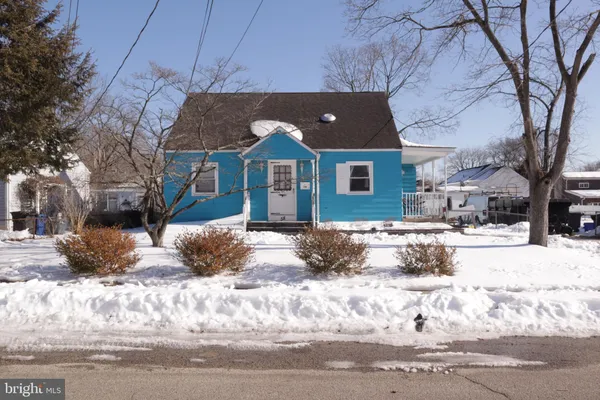 a view of a house with a snow