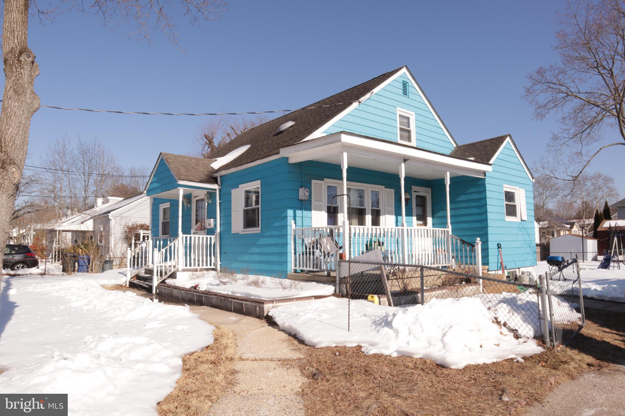 58 Watson Boulevard Clementon, NJ 08021 - Photo 3 of 4 a view of a house with snow on the road