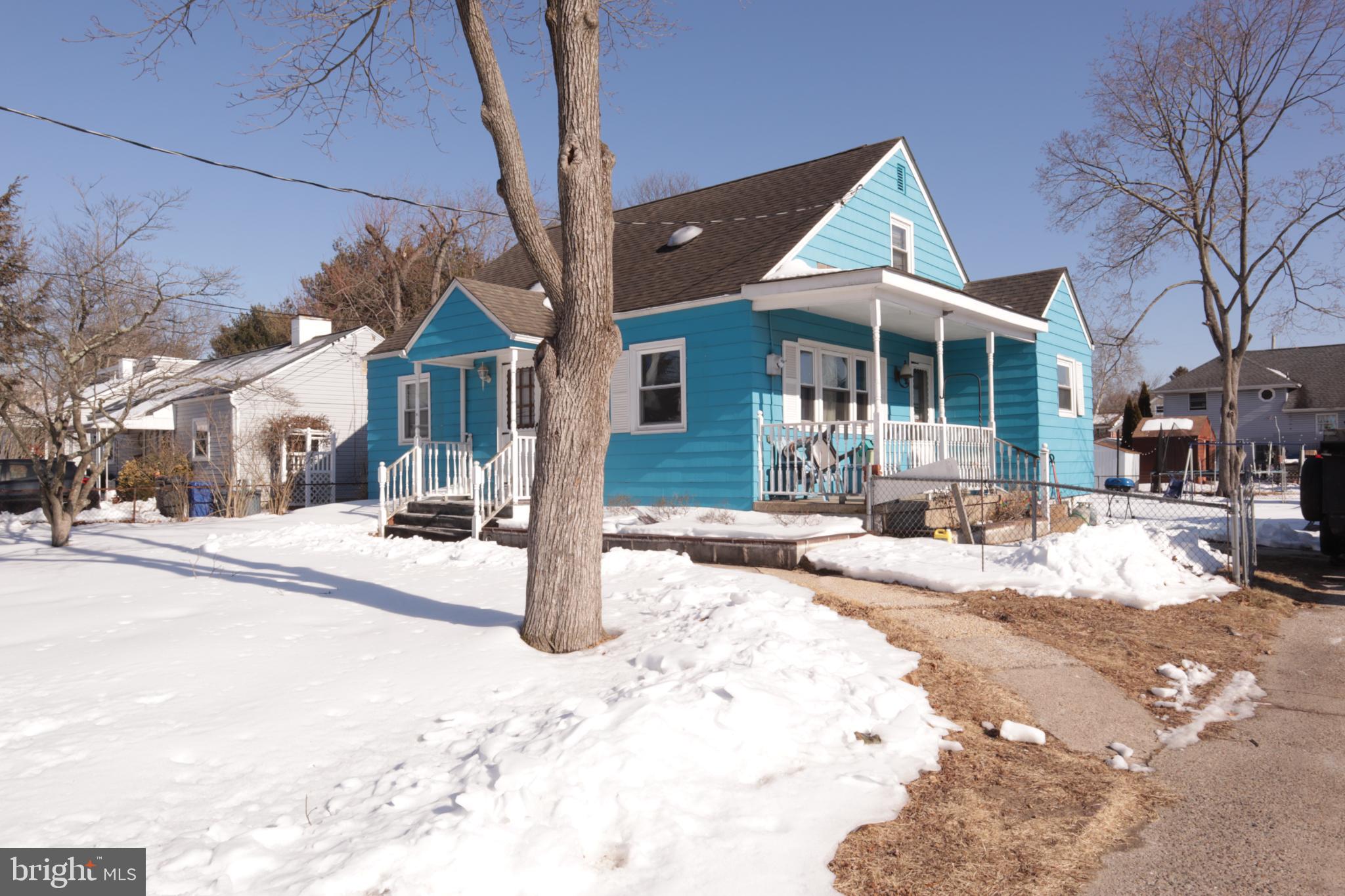 58 Watson Boulevard Clementon, NJ 08021 - Photo 4 of 4 a front view of a house with a yard covered in snow