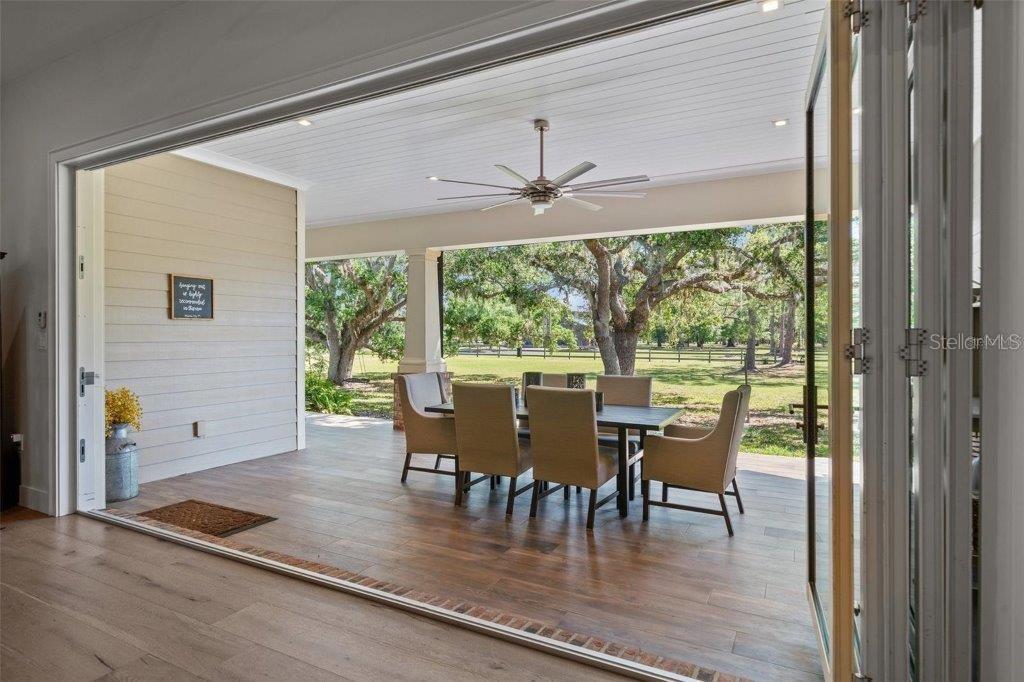 12615 River Road Myakka City, FL 34251 - Photo 12 of 88 a view of a dining room with furniture window and outside view
