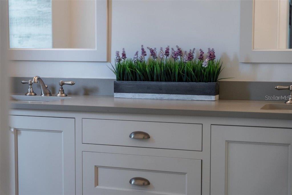 12615 River Road Myakka City, FL 34251 - Photo 27 of 88 a bathroom with a sink and a mirror