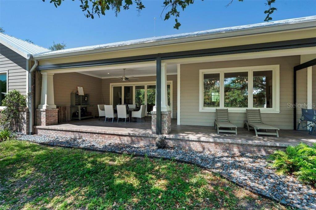 12615 River Road Myakka City, FL 34251 - Photo 47 of 88 a front view of a house with garden