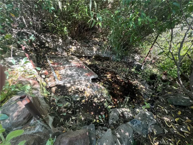 a kitchen with a sink and large window