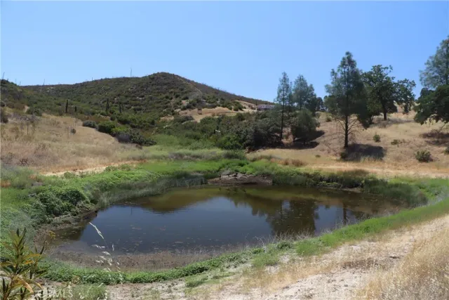 a view of a lake with mountains in the background