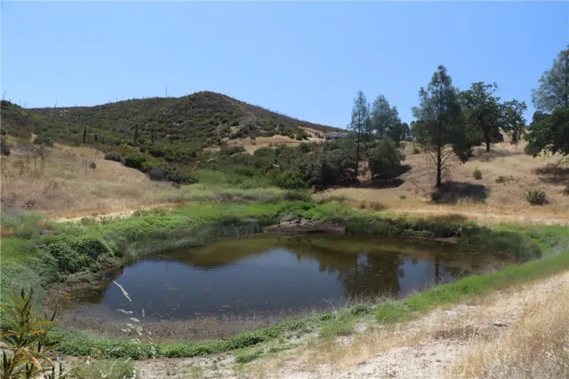 a view of a lake with mountains in the background