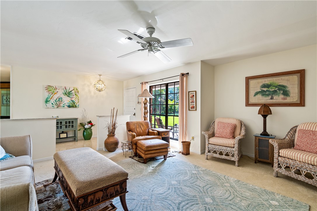 635 Live Oak Road Vero Beach, FL 32963 - Photo 14 of 35 a living room with furniture and a large window