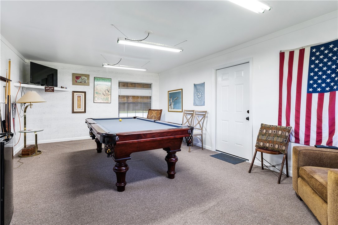 635 Live Oak Road Vero Beach, FL 32963 - Photo 25 of 35 a room with furniture pool table and windows