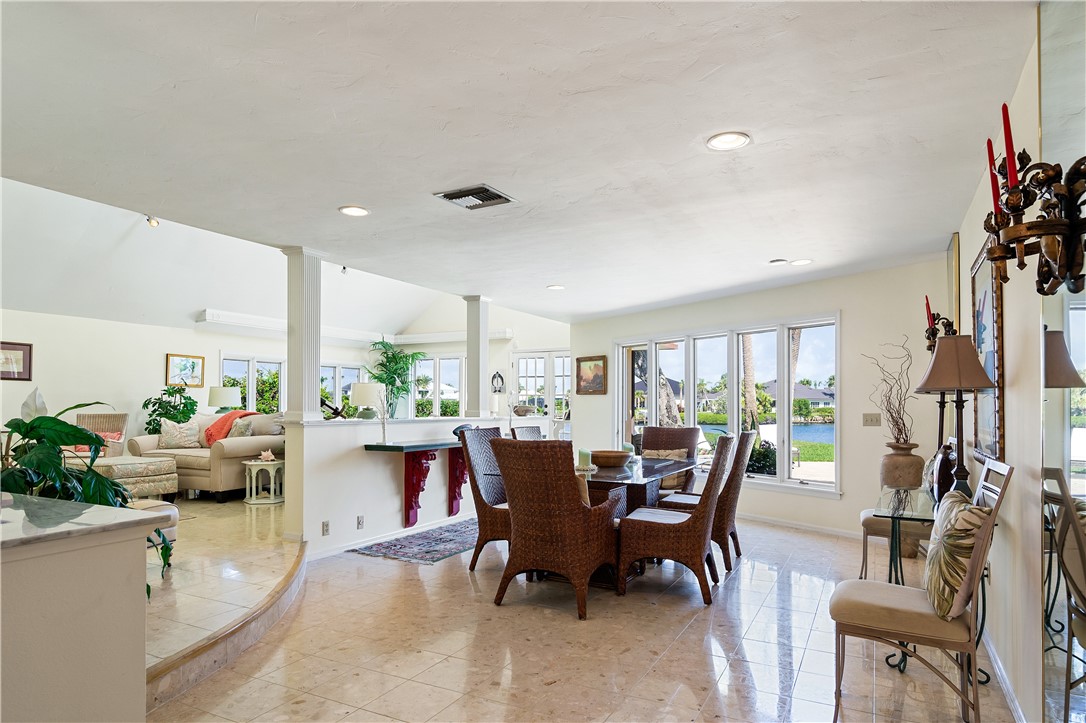 635 Live Oak Road Vero Beach, FL 32963 - Photo 8 of 35 a view of a dining room with furniture window and outside view