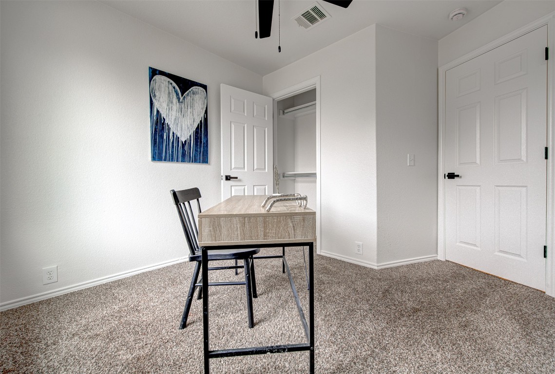 6249 Negley, Unit B Kyle, TX 78640 - Photo 13 of 26 Carpeted office space featuring a ceiling fan and baseboards
