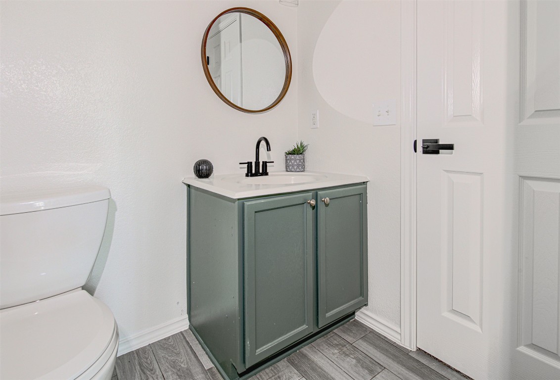 6249 Negley, Unit B Kyle, TX 78640 - Photo 16 of 26 Half bath with toilet and vanity