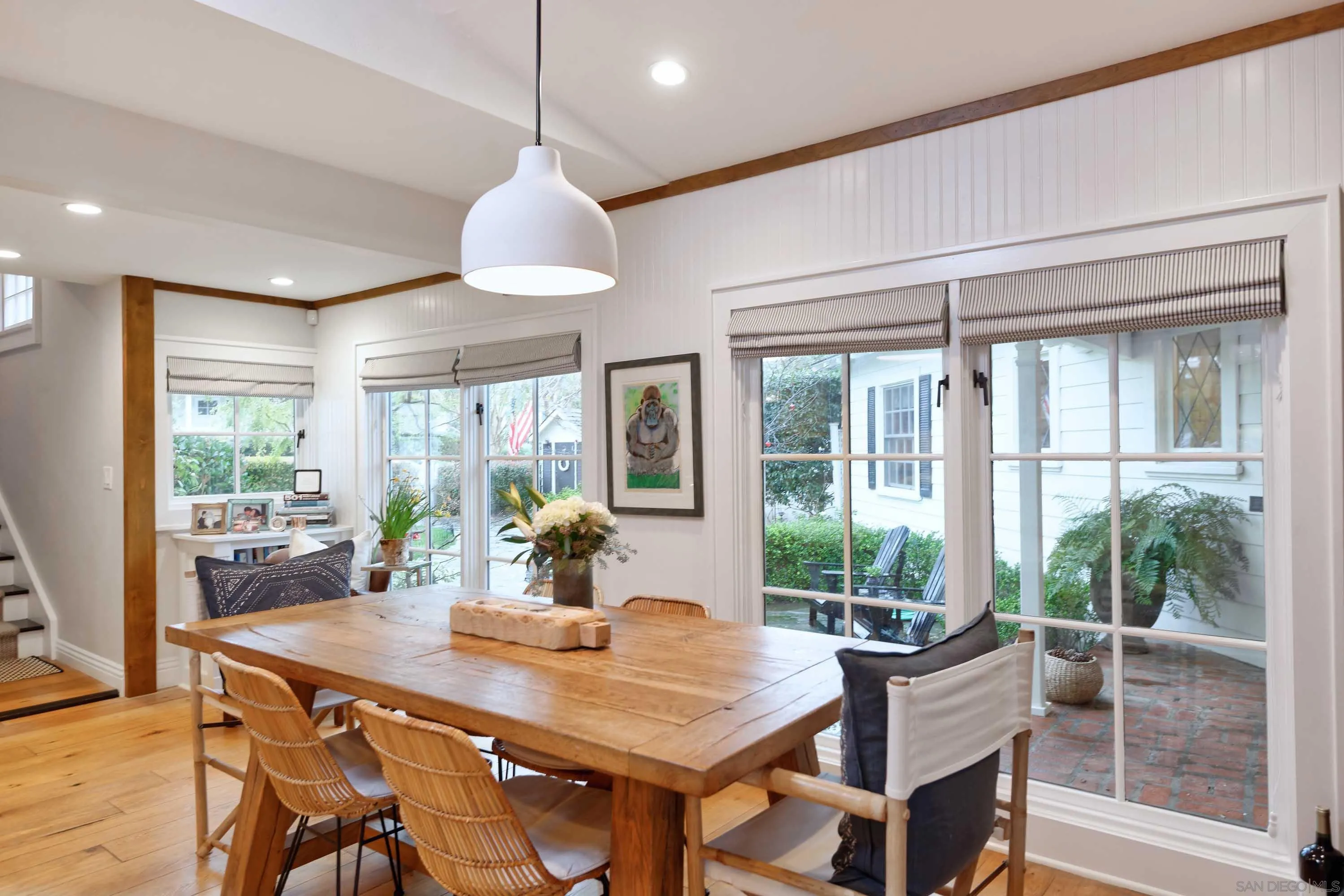 5844 Beaumont Avenue La Jolla, CA 92037 - Photo 11 of 26 a view of a dining room with furniture window and outside view