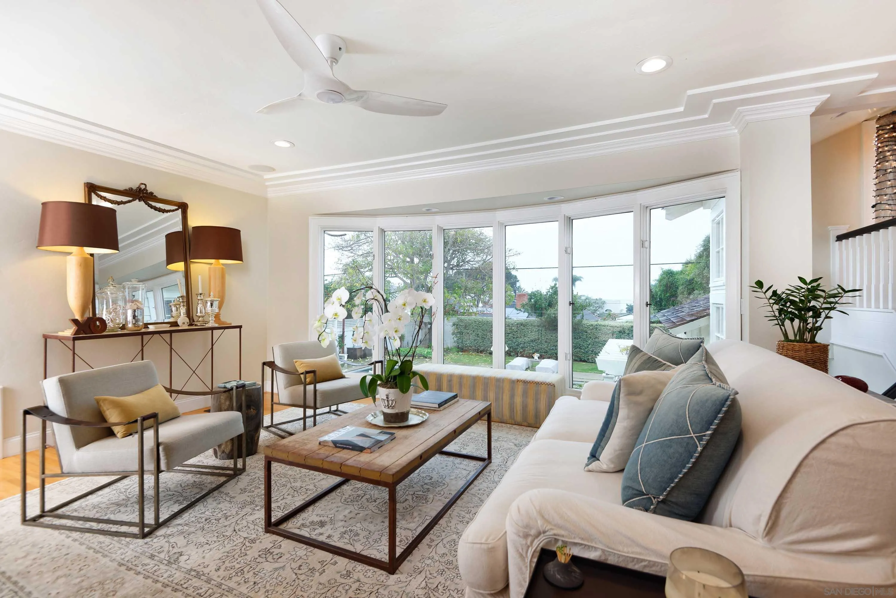 5844 Beaumont Avenue La Jolla, CA 92037 - Photo 14 of 26 a living room with furniture and a large window