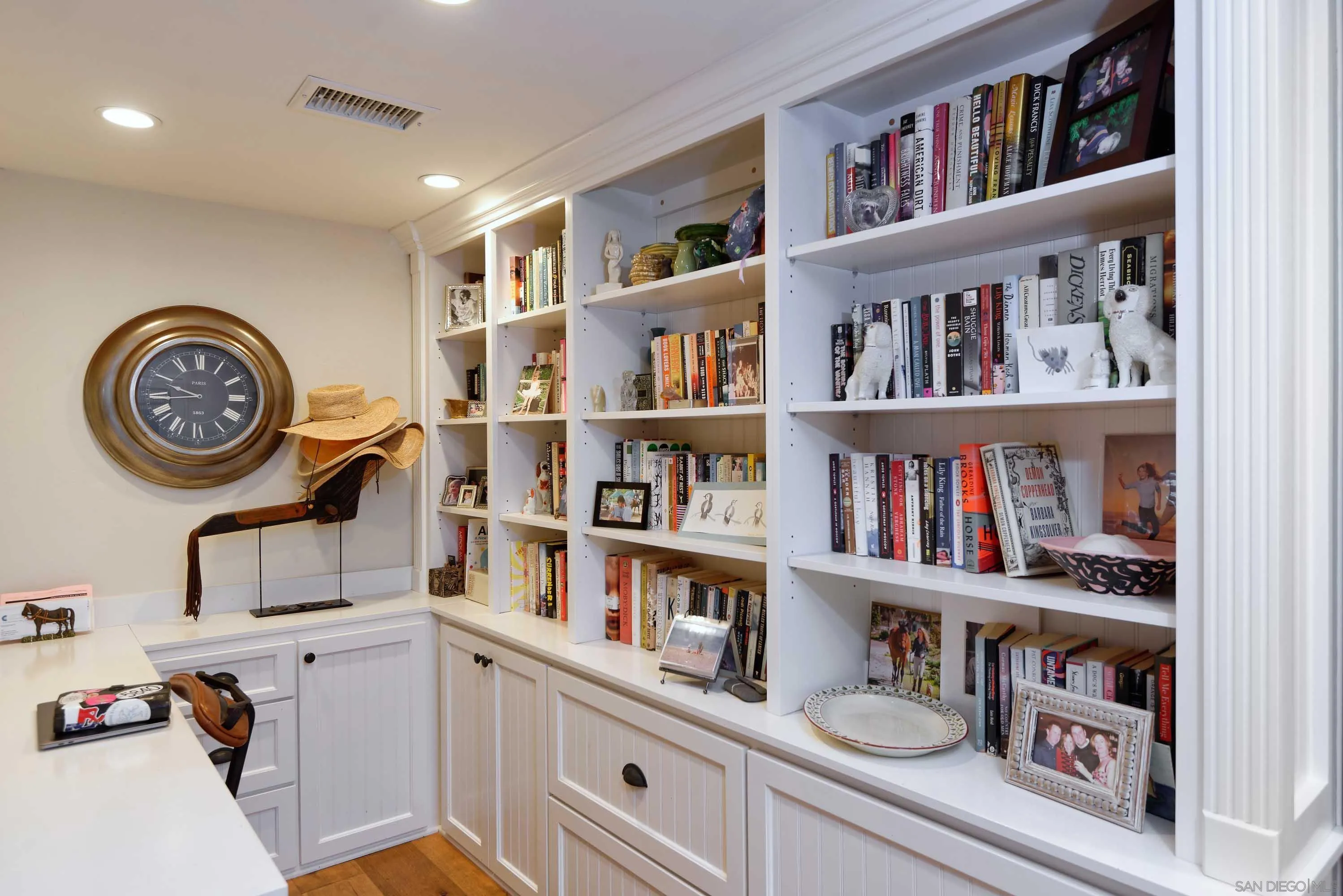 5844 Beaumont Avenue La Jolla, CA 92037 - Photo 15 of 26 a workspace with a book shelf