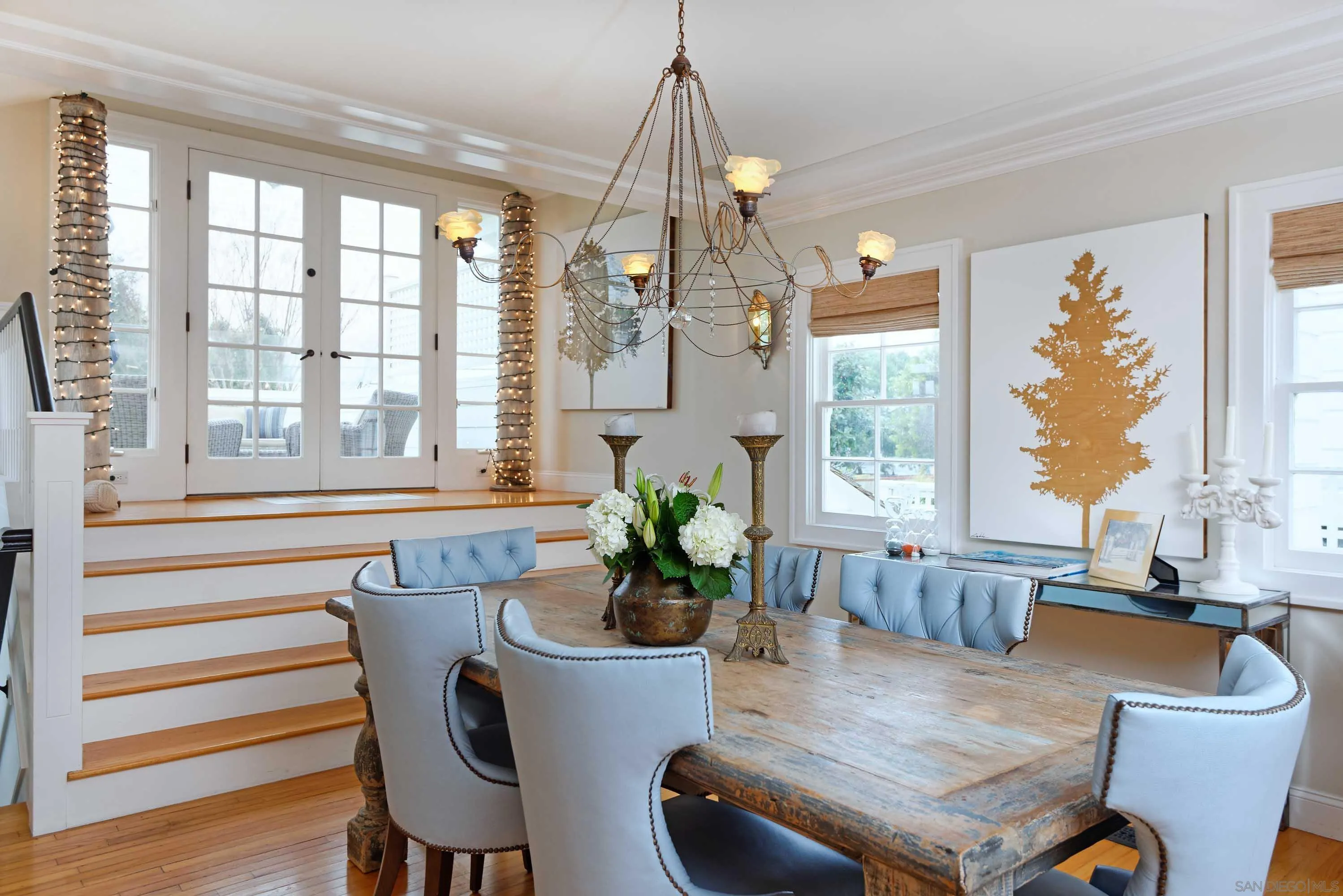5844 Beaumont Avenue La Jolla, CA 92037 - Photo 5 of 26 a view of a dining room with furniture window and wooden floor