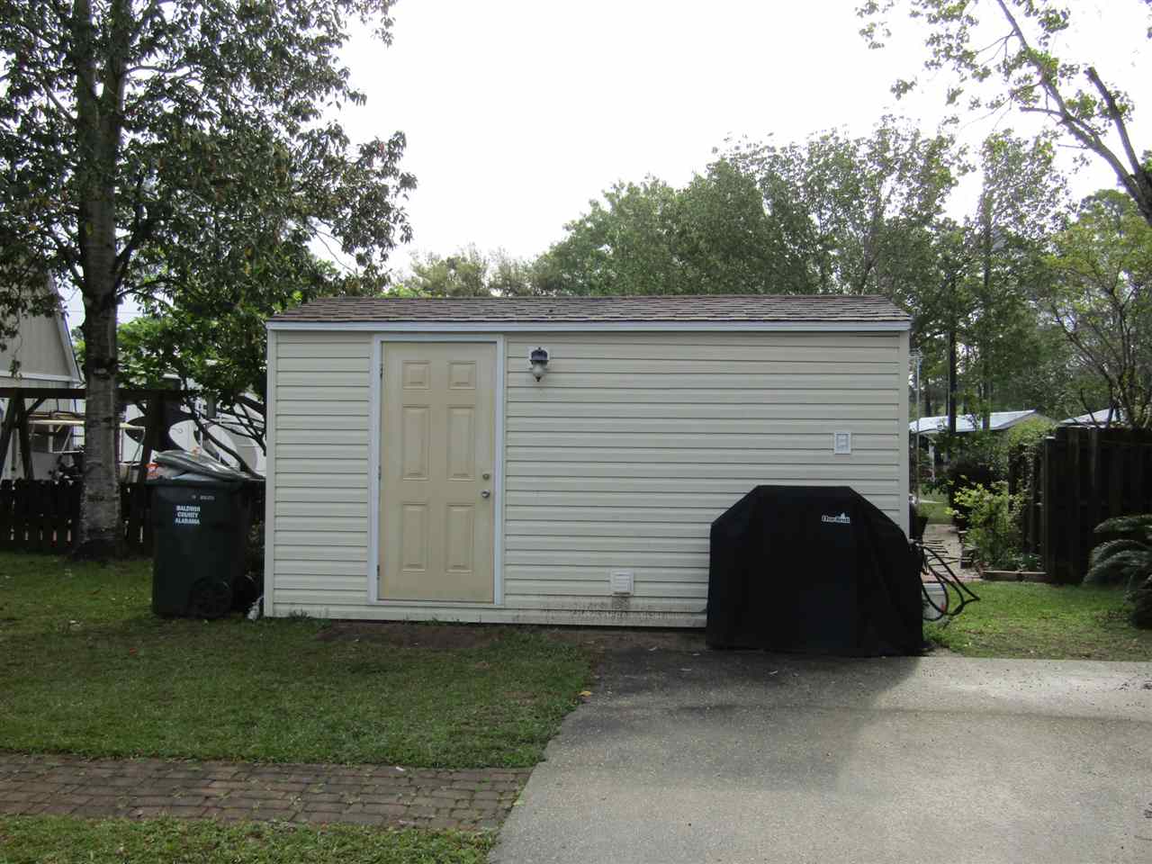 135 Defuniak Loop Lillian, AL 36549 - Photo 22 of 24 RV Shed