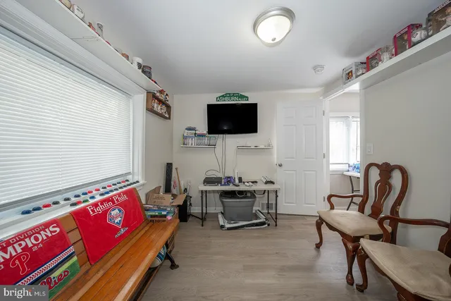 a view of a house with a chairs in a patio