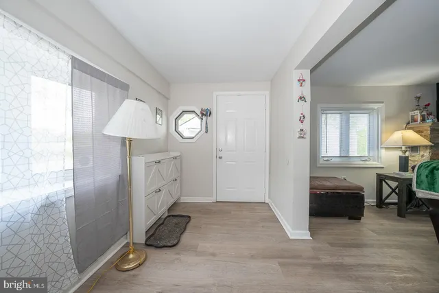 a view of a pathway with a wrought fence