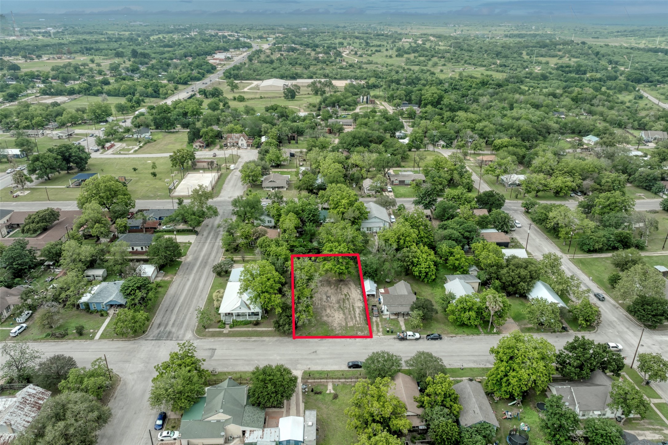 809 East Fannin Street Luling, TX 78648 - Photo 9 of 16 an aerial view of a houses with outdoor space and street view