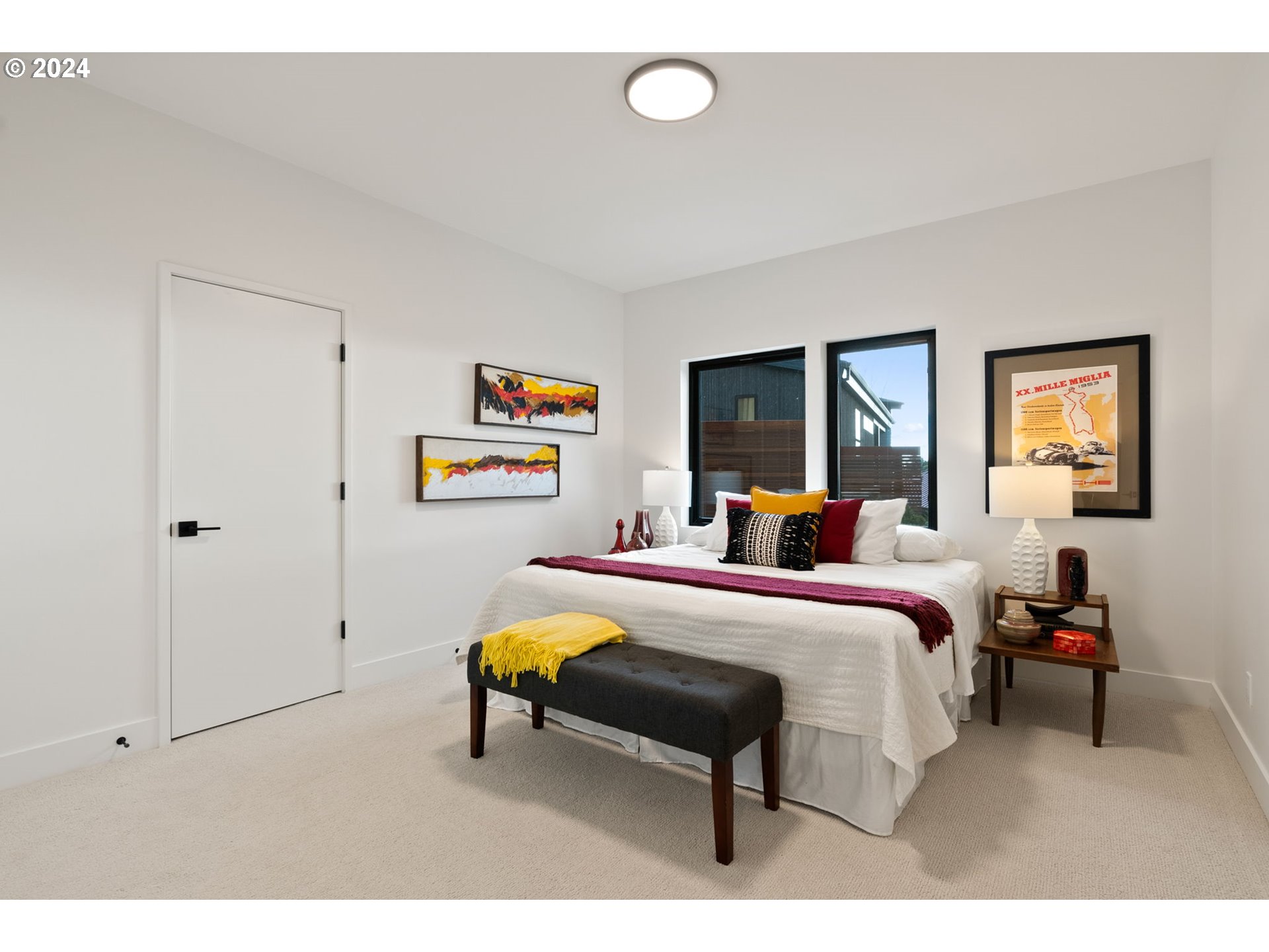 8236 Northwest Thompson Road Portland, OR 97229 - Photo 33 of 48 a bed room with a bed and a table