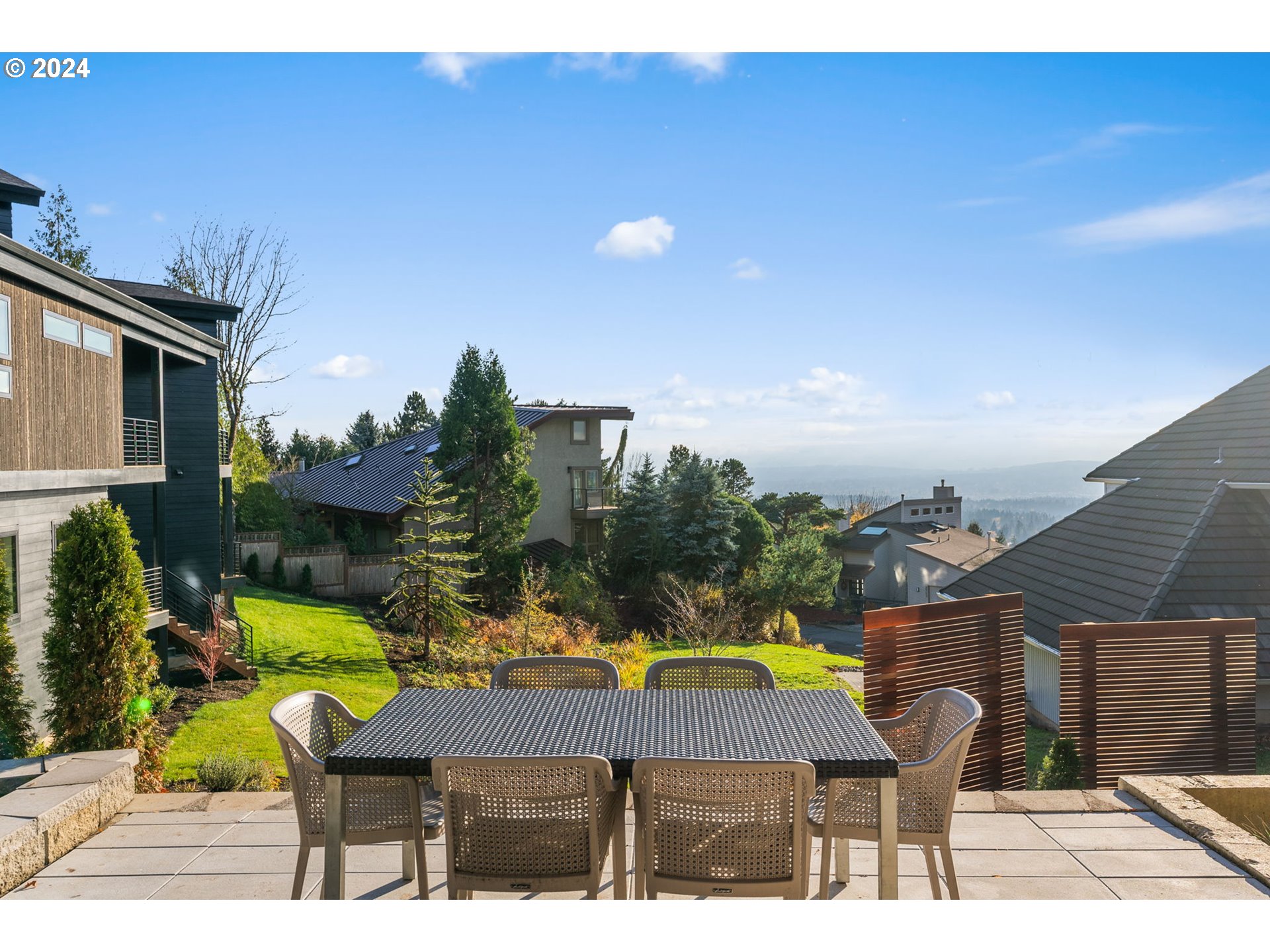 8236 Northwest Thompson Road Portland, OR 97229 - Photo 41 of 48 a view of swimming pool with seating space and yard in back