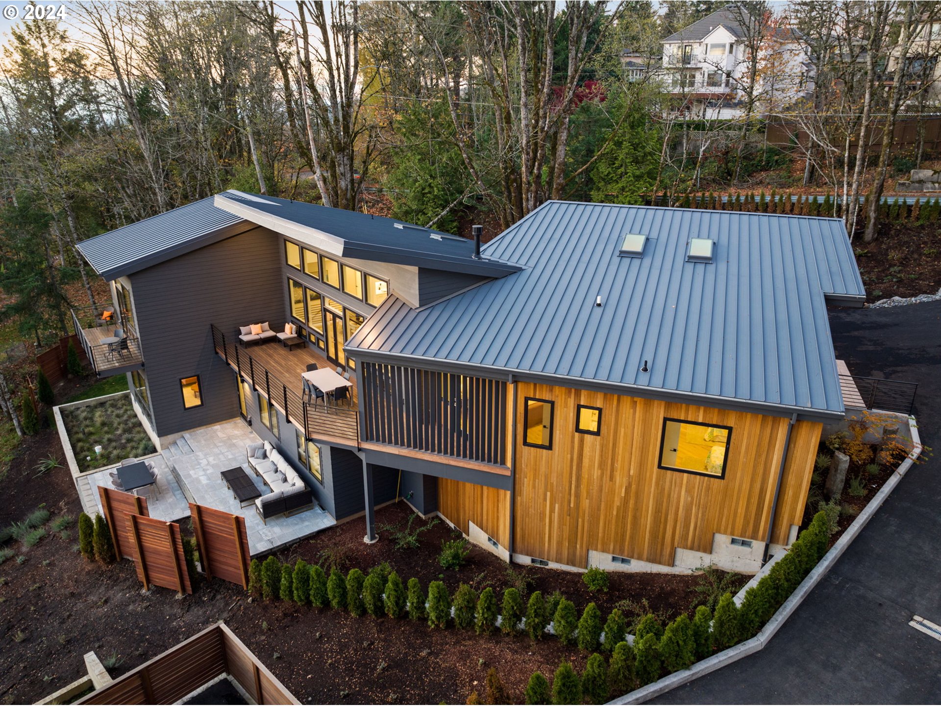 8236 Northwest Thompson Road Portland, OR 97229 - Photo 47 of 48 a view of a roof deck with wooden floor and fence