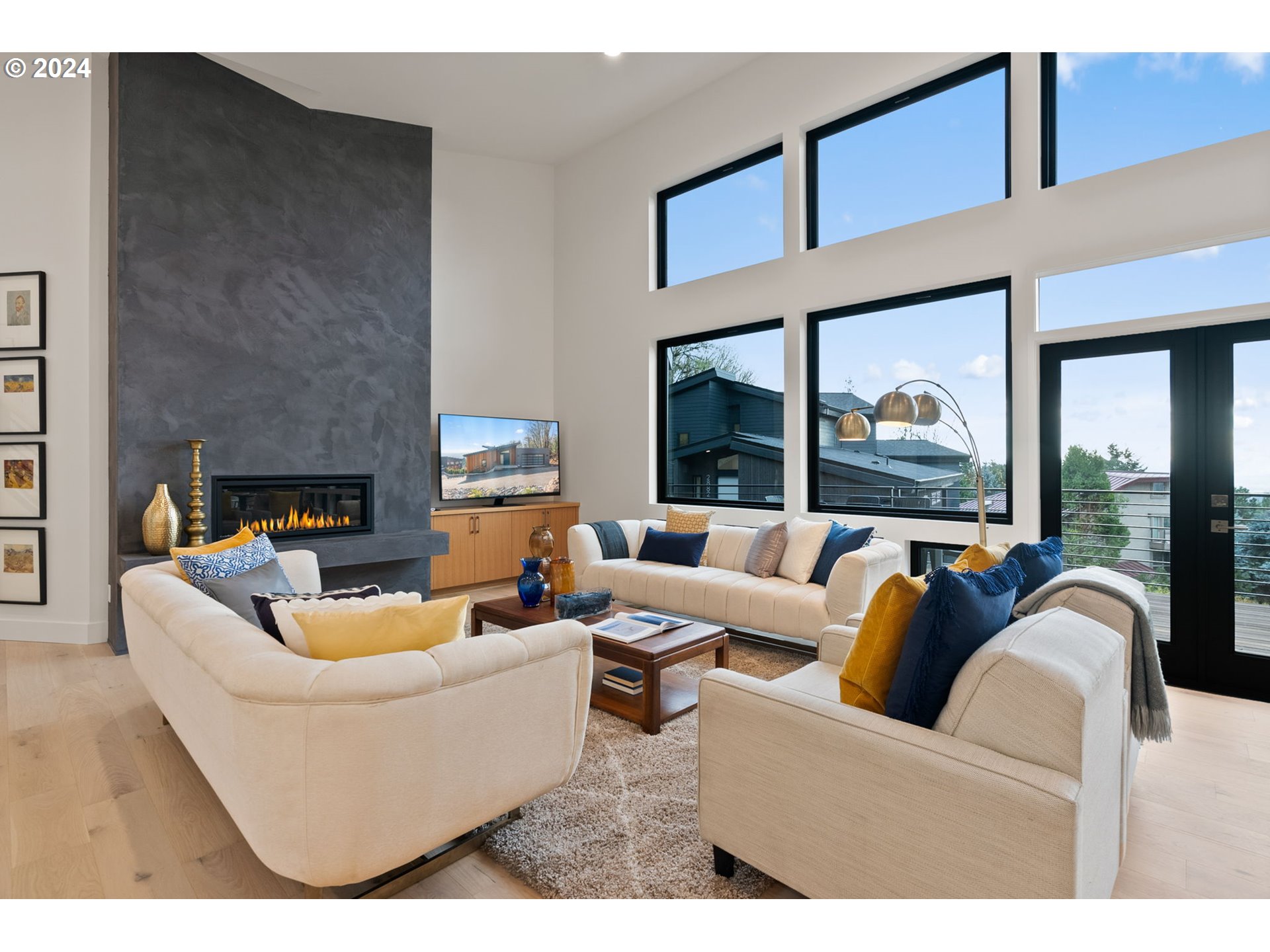 8236 Northwest Thompson Road Portland, OR 97229 - Photo 6 of 48 a living room with fireplace furniture and a large window