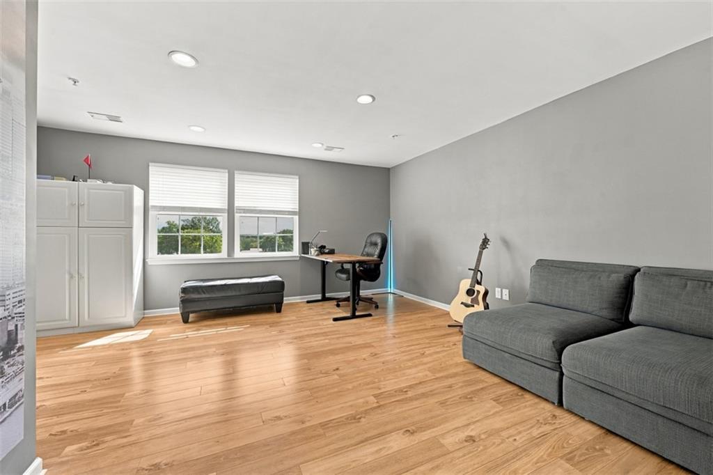 141 Lewisham Road Cranberry Township, PA 16066 - Photo 37 of 50 Hard surface floors were added to compliment this room. This flex space can be a bedroom, office, workout room or even the upstairs man cave.