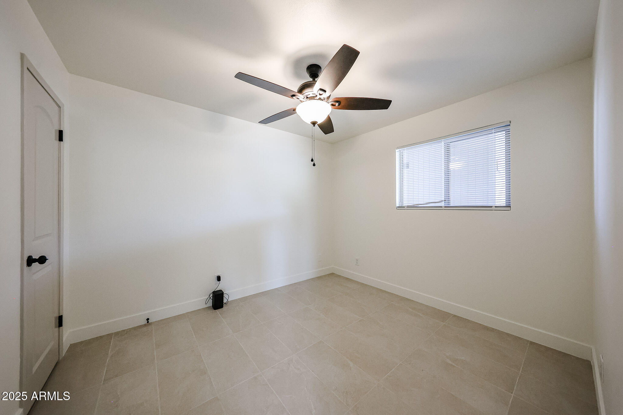 10202 North 15th Avenue, Unit 2 Phoenix, AZ 85021 - Photo 14 of 34 a view of an empty room