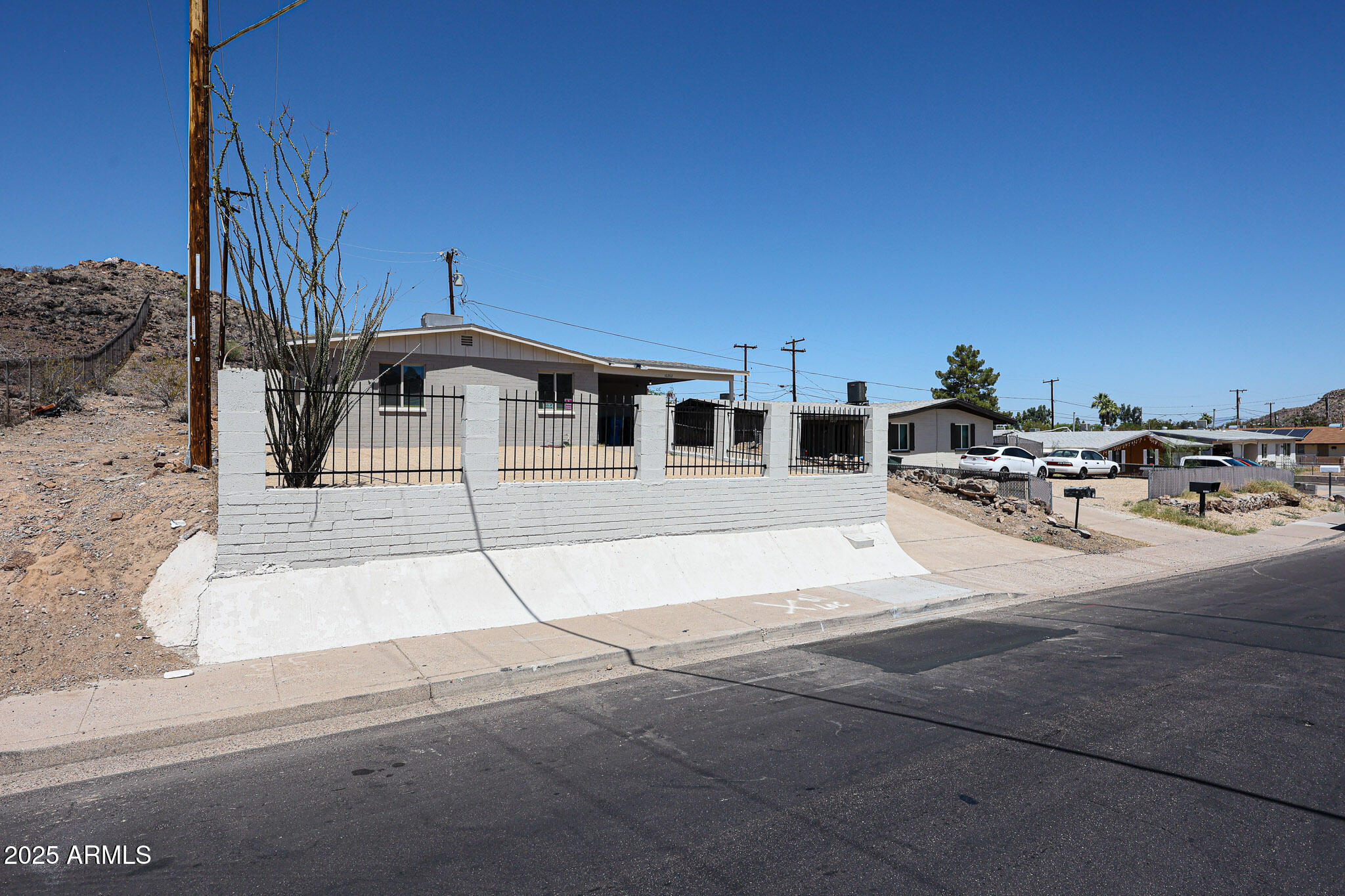 10202 North 15th Avenue, Unit 2 Phoenix, AZ 85021 - Photo 2 of 34 a view of a building with entryway