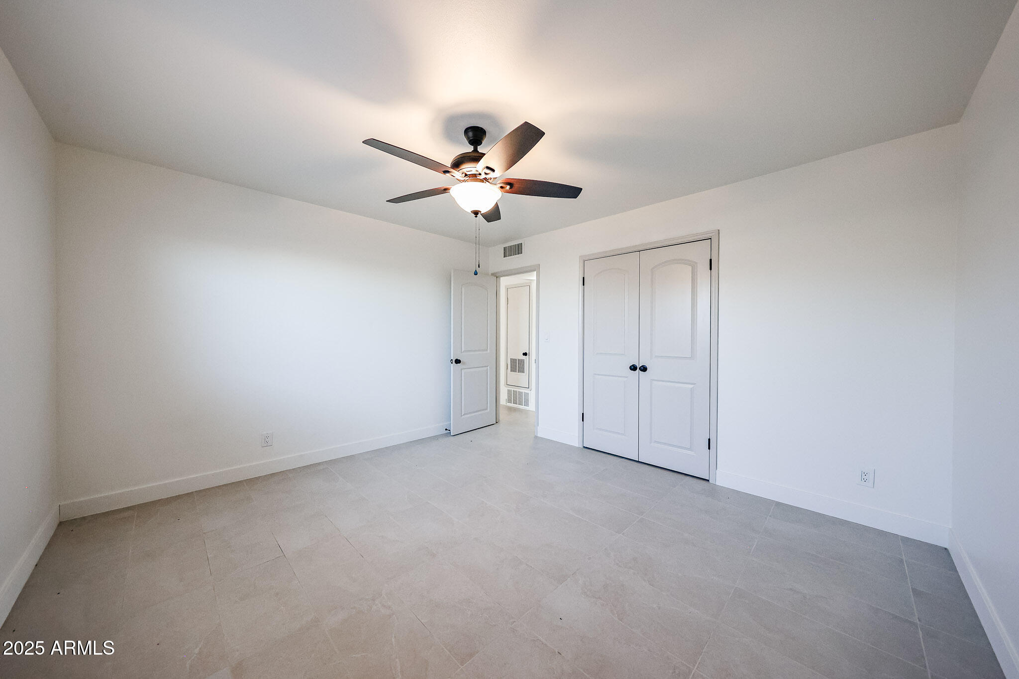10202 North 15th Avenue, Unit 2 Phoenix, AZ 85021 - Photo 24 of 34 a view of an empty room