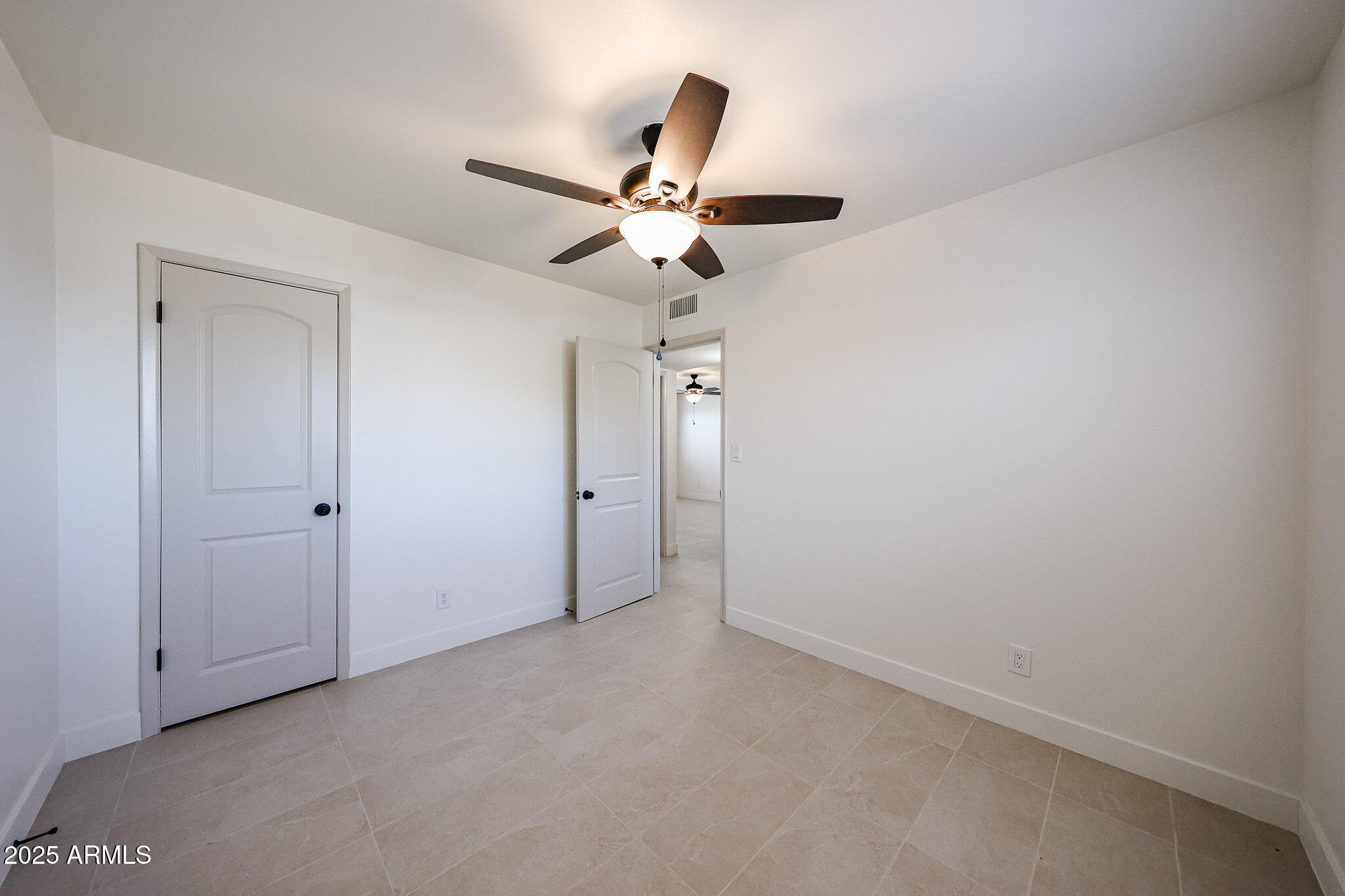 10202 North 15th Avenue, Unit 2 Phoenix, AZ 85021 - Photo 27 of 34 a view of an empty room
